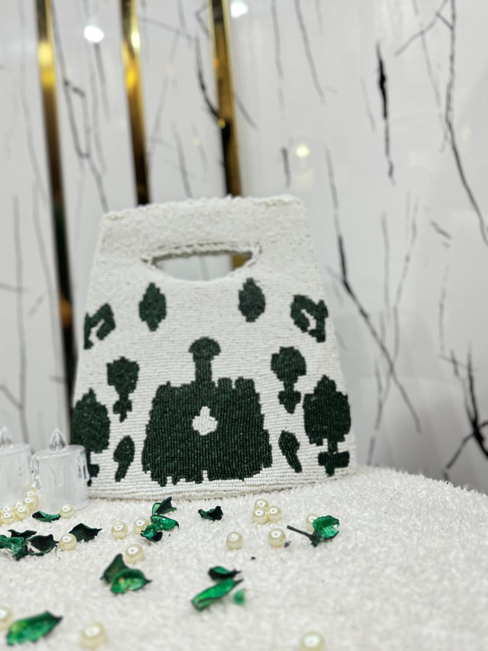White & Green Handmade Beauty Bag with Elegant Detailing”