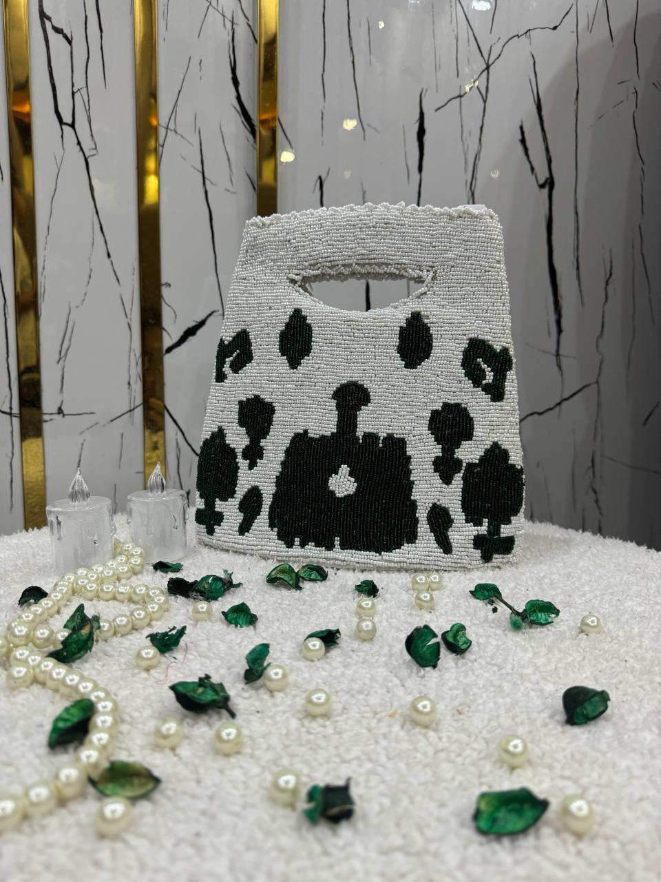 White & Green Handmade Beauty Bag with Elegant Detailing”