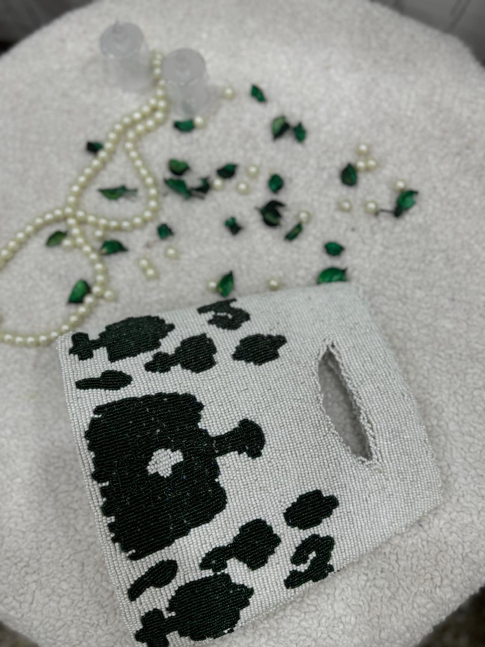 White & Green Handmade Beauty Bag with Elegant Detailing”